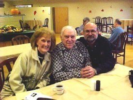 Mr. and Mrs. G. Larry Gorr with their son-in-law, Kenneth L. Arnold
