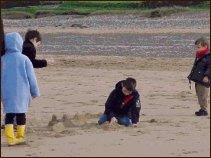 children playing on Omaha beach